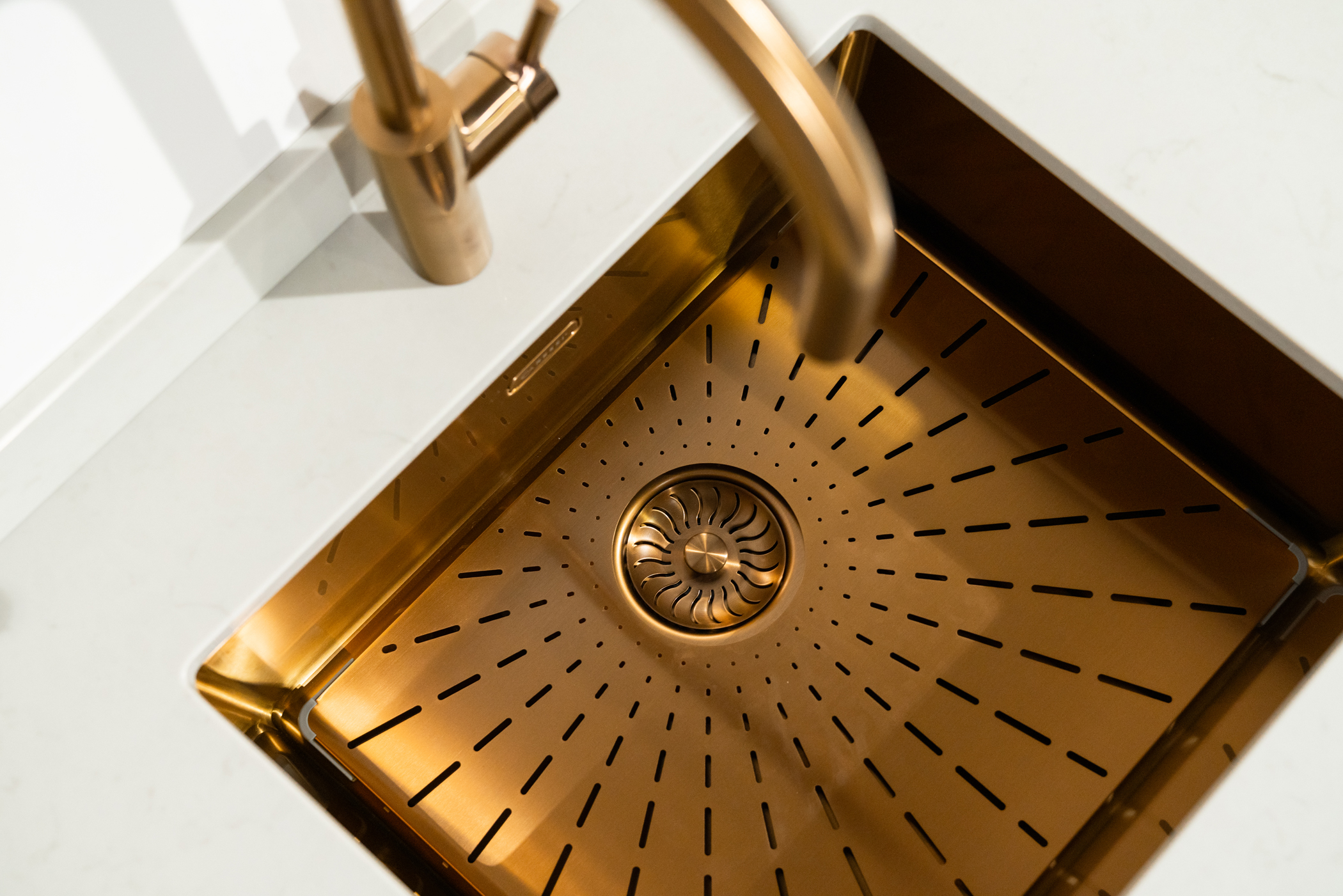 Gouden spoelbak en kraan